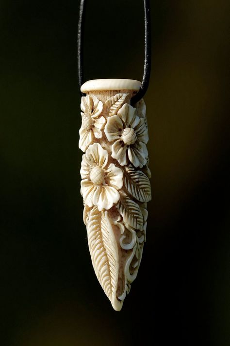 mammoth-ivory 2 by manuroartis on DeviantArt Mammoth Ivory, Reindeer Horns, Push Dagger, Antler Pendant, Fallow Deer, Horn Pendant, Bone Carving, Antlers, Reindeer