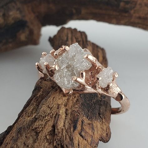 Raw stone engagement rings