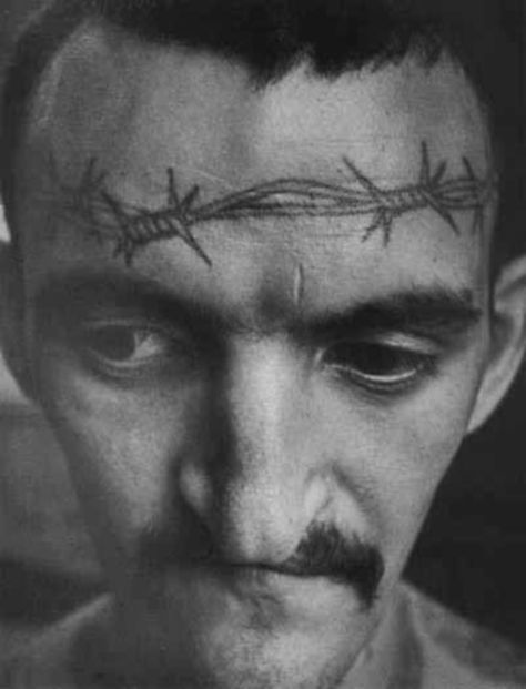 The Secret Meanings Of Russian Prison Tattoos - Pop Culture Gallery Forehead Tattoo, Russian Prison Tattoos, Tattoo Mafia, Barbed Wire Tattoos, Russian Tattoo, Pirate Tattoo, Prison Tattoos, Tattoo Bracelet, Horror Tattoo