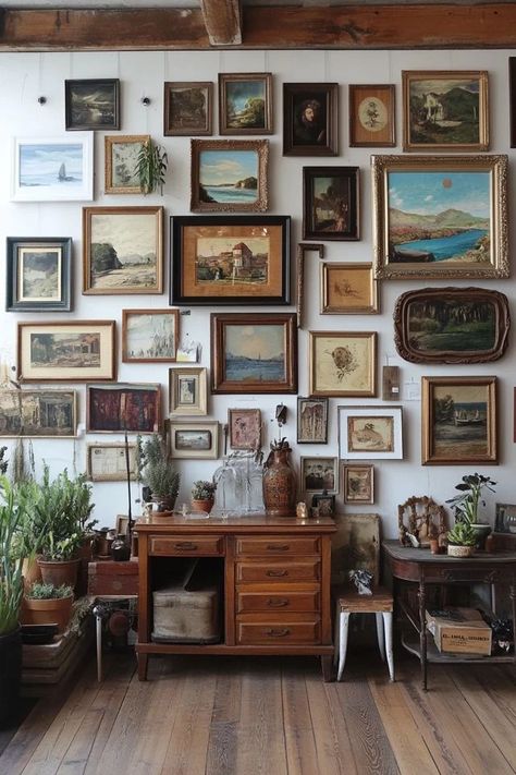 "Create a unique focal point with a Vintage-Inspired Gallery Wall! 🖼️🕰️ Perfect for combining modern and classic elements to reflect your personal style. 🌟✨ #HomeDecorIdeas #VintageArt #GalleryWallDesign" Eclectic Gallery Wall Ideas, Vintage Gallery Wall Ideas, Gallery Wall Dining Room, Gallery Wall Eclectic, Vintage Art Gallery Wall, Antique Gallery Wall, Art Gallery Wall Ideas, Art Gallery Design, Military Office