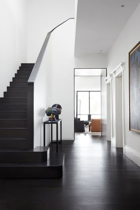 Centennial Park House by Madeleine Blanchfield | est living Australian Architects, Madeleine Blanchfield, Black And White Hallway, Black Floors, Black Wood Floors, Interior Flooring, White Hallway, Wood Floor Design, Australian Interior