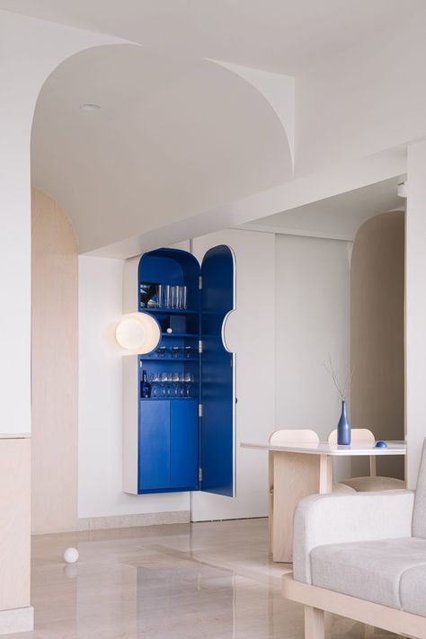 Ten residential interiors that are refreshed by splashes of blue Milano Interior Design, Cobalt Blue Decor, Geometric Chair, Memphis Milano, High Rise Apartments, Ceiling Storage, Primary Colours, Family Apartment, Brick Facade