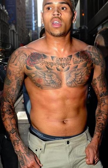 Chris Brown Wings Chest Tattoo Chris Brown Chest Tattoo, Chris Brown Tattoos, Celebrity Tattoos Male, Chest Tattoo With Meaning, Chris Brown Shirtless, Brown Tattoos, Aries Things, Best Celebrity Tattoos, Brown Tattoo