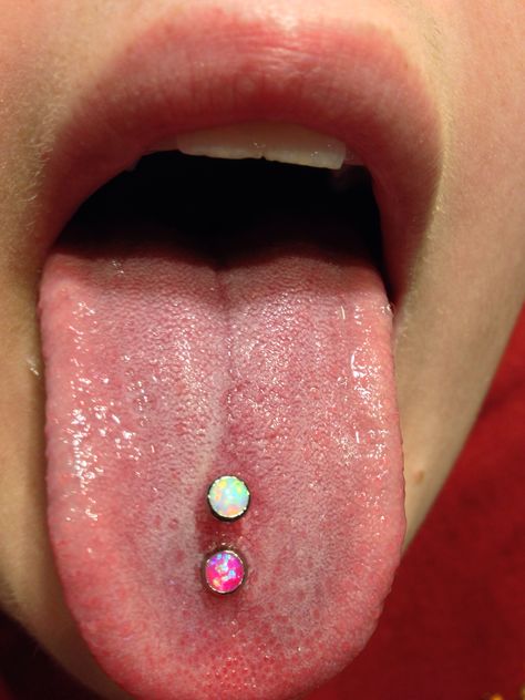 Double tongue piercing with the beautiful opals from Industrial Strength. Tongue Piercings Ideas, Vertical Scoop Tongue Piercing, Tongue Piercing Double, 2 Tongue Piercing, Double Tounge Piercings, Two Tongue Piercings, Double Tongue Piercing Vertical, Multiple Tongue Piercings, Scoop Tongue Piercing