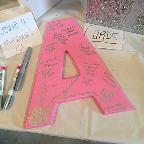 This was a huge hit and great idea for my open house. Wooden letter for anyone to sign and take it with you to college! We bought the letter at Joanns and painted it pink then used metallic silver sharpies! Sweet 16 Memory Ideas, 18th Birthday Party Ideas Pink And White, Unique Sweet 16 Ideas, Sweet 16 Party Ideas Pink And Silver, 18th Birthday Party Pink And White, Birthday Ideas Sweet 16, Pink And Silver Birthday Party Sweet 16, 15th Birthday Party Ideas At Home, Pink Open House Graduation