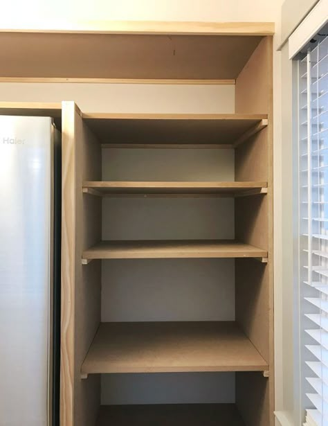 Learn how we constructed DIY pantry shelves in our beach house using a simple construction technique and just two materials: MDF panels and 1x2" boards. Build Pantry Shelves, Build Pantry, Diy Pantry Cabinet, Building Cabinets, Diy Pantry Shelves, Small Kitchen Pantry, Diy Pantry Organization, Diy Storage Shelves, Pantry Shelves