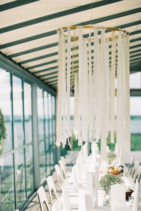 Suspended ribbon centerpieces | Classic Chic Swedish Summer Archipelago Wedding At Dalarö Skans | Photograph by 2 Brides Photography  http://storyboardwedding.com/classic-chic-swedish-summer-archipelago-wedding-dalaro-skans/ Swedish Wedding Decoration, Scandinavian Wedding Decor, Ribbon Centerpieces, Ikea Hacks Wedding, Ribbon Wedding Decorations, Brides Photography, 2 Brides, Scandinavian Wedding, Swedish Wedding