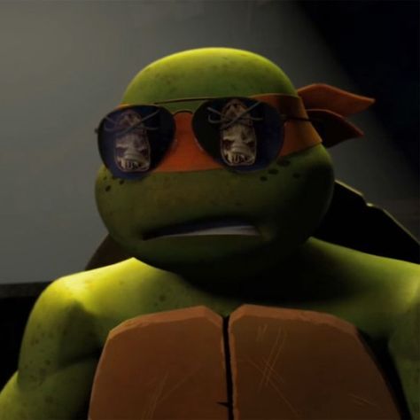 Michelangelo worlds cutest interrogator Michel Angelo Ninja Turtle, Teenage Mutant Ninja Turtles Michelangelo, Mikey Icon Tmnt, Michelangelo Tmnt Pfp, Michaelangelo Tmnt Pfp, Michaelangelo Tmnt 2012, Michelangelo Tnmt, Mikey 2012 Tmnt, 2012 Michelangelo