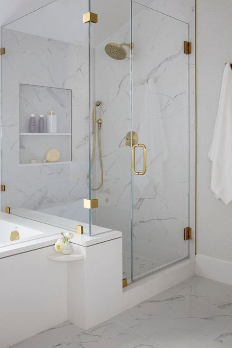 walk-in shower ideas gold fixtures Modern Bathroom Trends, White Marble Shower, Walk In Shower Ideas, Ceiling Shower Head, Collected Interiors, Shower Tiles, Sleek Bathroom, Marble Showers, Geometric Floor