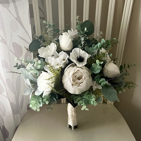 "Classic wedding bouquet, ivory roses & hydrangea with eucalyptus bridal flowers, boho silk flower wedding, ivory peony fern bridesmaid flowers  Each of my wedding bouquets are made with high quality, silk (artificial) flowers and elements.  As Shown; Bridal 13-14\" Shown Small bride 11-12\" Bridesmaid 9-10\" The bouquet pictured may have already sold; so, I will be creating a re-make for you. Each item is made to order, you can choose from different options at checkout. Making a purchase in my shop means you acknowledge and agree with my shop's policies. Please take a look at the policies before ordering. For standard orders, please check the shipping information within each listing, our shop policies, or our shop announcement for current production times. If you are in a rush, please con Peonies And Eucalyptus Bouquet, Wedding Bouquets Simple, Peonies Wedding Bouquet, Peony Wedding Flowers, Green And White Bridal Bouquet, Classic Bridal Bouquet, Classy Weddings, Peony Bridal Bouquet, Classic Wedding Bouquet