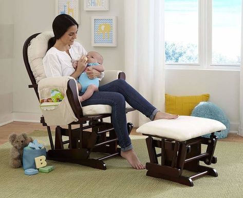 A glider chair with padded arm cushions, two side pouches for reachable storage, and a stool (that'll also glide) to rest your feet. Breastfeeding Chair, Nursery Glider Chair, Baby Glider, Glider And Ottoman, Rocking Chair Cushions, Wood Rocking Chair, Nursery Glider, Rocking Chair Nursery, Nursing Chair