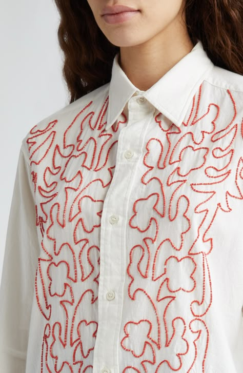 Inspired by vintage embroidery, this cotton button-up shirt is detailed with bright red beads arranged in a vine-like design. 29" front length; 31" back length (size Medium) Front button closure Point collar Long sleeves with button cuffs 100% cotton Dry clean Imported Designer Clothing Collar Details Fashion, Amazing Embroidery Designs, Embroidery Designs With Beads, Collar Embroidery Design, Free Motion Embroidery Designs, Embroidery Outfits, Random Embroidery, Beads Shirt, Embroidery On Shirt