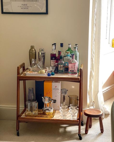 Cait 〰️ interiors + lifestyle | New (old) bar cart alert 🍸 picked this beauty up for the grand sum of five English pounds at a car boot sale at the weekend, and couldn’t… | Instagram Bar Cart Mid Century, Alcohol Tray Bar Carts, Small Space Bar Cart, Cocktail Bar Ideas Home, Bar Cart Items, Scandinavian Bar Cart, Bar Cart Table, Wood Bar Cart Styling, Bar Cart Home