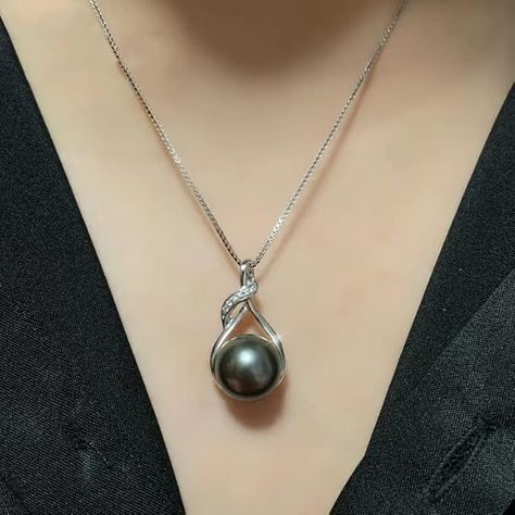 Tahitian-Black-Pearl-Necklace
✨ 
Buy this product from AMAZON 
✨ 
Product Details:
•Black pearl necklace 9-10mm,18K Gold Plated 925 sterling silver
•Material : Sterling Silver
•Metal type : Sterling Silver
•Clasp type : Round Clasp
•Chain type : Box
•Metal weight : 3.24 g
•Gem type : Tahitian black pearl
•Country of Origin : China Real Pearl Earrings, Black Pearl Necklace, Tahitian Black Pearls, Buy Necklace, Real Pearls, Silver Material, Black Pearl, Types Of Metal, Metallic Silver