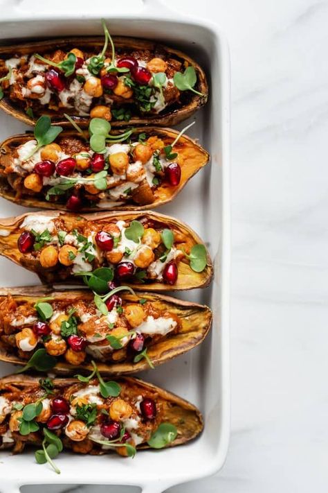 These Moroccan stuffed sweet potatoes are loaded with Moroccan spiced eggplant, crispy chickpeas and tahini for a healthy vegetarian meal! Moroccan Potatoes, Potatoes Stuffed, Stuffed Sweet Potato, Stuffed Sweet Potatoes, Loaded Sweet Potato, Delicious Clean Eating, Crispy Chickpeas, Vegetarian Meal, Sweet Potato Recipes