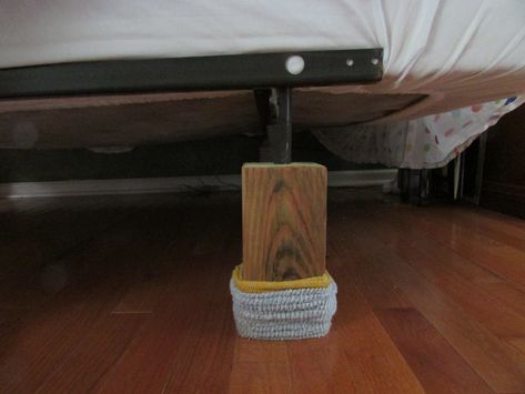 Bed risers for metal bed frames. Use fence posts cut down to size as bed risers.  Hubby bought and had Lowes cut to length, then drilled holes in center of each.  Took of wheels from frame and dropped metal legs in holes. Covered with old hunting socks to protect floor. Bed skirt covers it all. Diy Bed Risers, Queen Bed Plans, Bed Frame Risers, Cheap Bed Frame, Bed Raisers, Bed Frame Legs, Diy Storage Bed, Furniture Risers, Diy Storage Rack