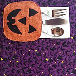 Free Halloween pumpkin placemat pattern featuring pumpkin pocket to hold utensils. Children will love setting the table with these placemats. Easy pattern. Fall, Halloween or Thanksgiving placemat pattern. Page 1 Pumpkin Assembly Pumpkin Placemats Pattern, Halloween Placemats Diy, Halloween Placemats Patterns, Felt Pumpkin Placemat, Fall Placemats Cloth, Pumkin Placemats, Pumpkin Patterns Free, Halloween Placemats, Thanksgiving Placemats