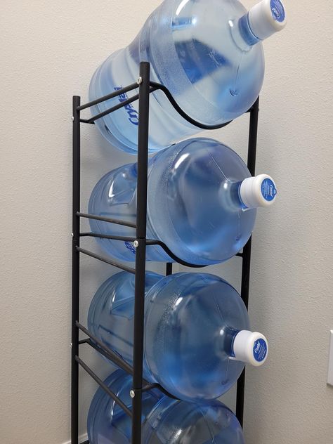 Check out this photo from femininetouch 5 Gallon Water Bottle, Bottle Organizer, Water Jugs, Gallon Water Jug, Gallon Water Bottle, Organizer Shelf, Water Jug, Break Room, Water Cooler