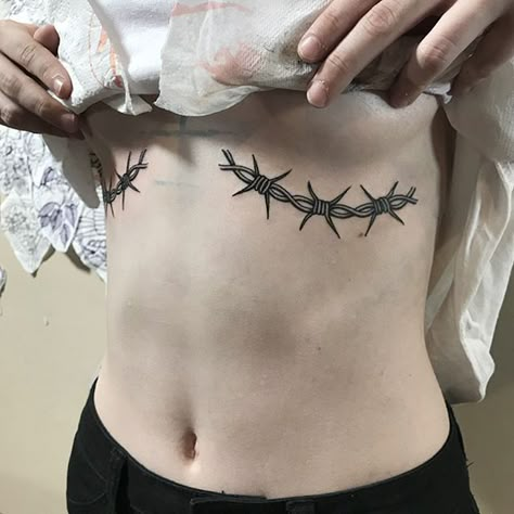 200+ Best Barbed Wire Tattoo Designs For Men and Women (2023) - TattoosBoyGirl Barbed Wire Tattoo, Types Of Tattoos, Wire Tattoo, Barbed Wire Tattoos, Underboob Tattoo, Peonies Tattoo, Tattoo Designs For Men, Tattoo Me, Piercings And Tattoos