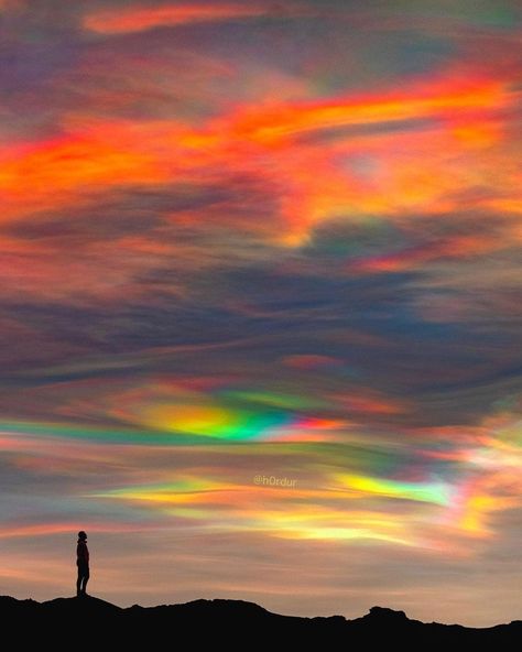 Polar Stratospheric Clouds ☁️🌈✨ ICELAND Experienced some of the most incredible polar stratospheric clouds I’ve ever seen in my life few days ago (also called nacreous clouds). The sun was rising so the orange glow blended with those unbelievable rainbow clouds. Polar stratospheric clouds are rare and only form in the Arctic polar region. Photo Credit.. h0rdur Polar Stratospheric Clouds, Stratospheric Clouds, Real Nature, Rainbow Sky, Sky Pictures, Rainbow Cloud, Natural Phenomena, Beautiful Sky, Photo Reference