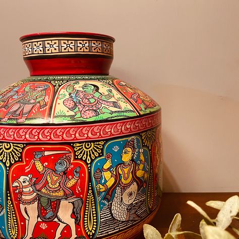 Can you think of a more beautifully adorned Matka? Beautiful, intricate Pattachitra art on this large 'Matka' or water pitcher... The origin of the Pattachitra paintings can be traced back to the 8th century AD and is considered as one of the earliest forms of indigenous paintings... #theindiacrafthouse #travellocal #makeinindia #skill #artoninstagram #india #design #handmade Painting On Matka, Matka Painting Designs, Mataka Art, Holi Dress, Matka Painting, Pattachitra Paintings, Indian Elephant Art, Pattachitra Art, Pichwai Painting