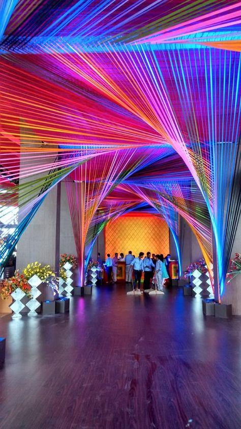 Outdoor Event Decor Diy Ideas, Colorful Event, Modern Stage Design, Ceiling Decoration Ideas, Immersive Event Design, Holographic Installation, Tomorrowland Stage Design, Coachella Installations, Music Festival Installation