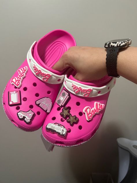 Pink Croc Aesthetic, Pink Crocs Aesthetic, Pink Croc Fits, Barbie Crocs, Uggs Slides, Bedazzled Crocs Shoes Pink, Pink Barbie Crocs, Pink Fuzzy Crocs, Pink Shopping