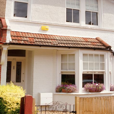 Exterior | Stylish white terrace | House tour | Ideal Home | PHOTO GALLERY 1930 House Exterior, Victorian Terrace House Exterior, 1930s House Exterior Uk, Terraced House Front Garden, White Terrace, 1930s House Exterior, Terrace House Exterior, Front Doors Uk, Ideal Home Magazine