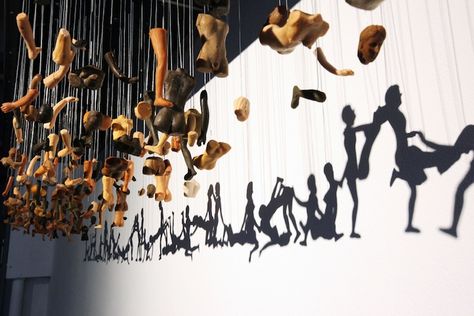 Provocative Shadow Art Created Through Suspended Doll Parts - Unity is a suspended installation by Korean artist Bohyun Yoon that takes fragmented pieces of dolls and transforms them into a line of people in suggestive poses. Source: My Modern Metropolis Suspended Installation, Sculptures Abstract, Chainsaw Carvings, Graffiti Artists, James Turrell, Olafur Eliasson, Metal Sculptures, Art Light, Shadow Art