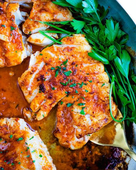 This pan fried cod is the best white fish you'll have! Dressed simply in paprika and fried in olive oil, it's healthy, stunning and irresistible all at once. | healthy seafood dinner recipes | healthy dinner ideas | easy healthy meals | #panfried #cod #codrecipe #panfriedcod #friedcod #fishrecipe #fastdinner #healthydinner #mediterraneandiet