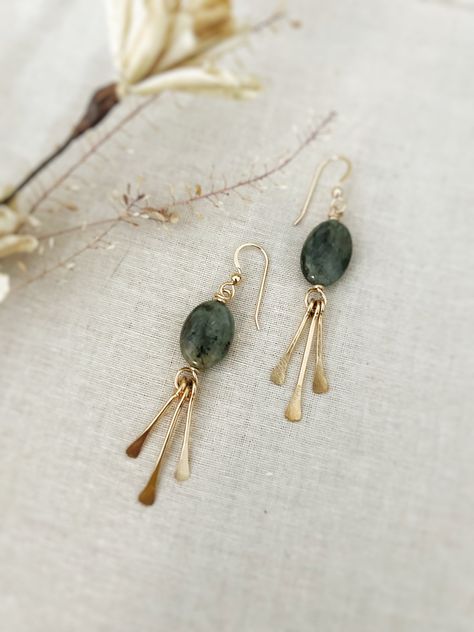 "All Designs, Copyright © 2017 Nox Jewelry  The Starla earrings are made from your choice  14k Gold Filled or Sterling Silver. Each earring is paired with your choice of gemstone: lapis, labradorite, chrysoprase, iolite or kyanite. Metal fringe ( cut to shape and hammered  tips) is added giving this earring beautiful movement.  - 14k gold filled or Sterling silver Ear Wires  - Choice of gemstone: lapis, labradorite, chrysoprase, iolite or kyanite - Approx Size: 2.5\" Long ( at its longest point) Lightweight Dangle Earrings, Gemstone Earring Ideas, Fall 2024 Fashion Trends Jewelry, Head Pins Jewelry, Earring Photography Styling, Jewelry Inspo Aesthetic, Metal Fringe Earrings, How To Solder Jewelry, Ear Jewelry Ideas