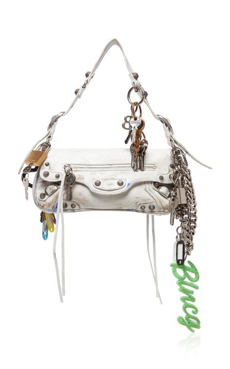 Find BALENCIAGA Le Cago Charm-detailed Leather Shoulder Bag Os on Editorialist. The Balenciaga Le Cago bag is crafted from extra-supple lambskin leather and features a rectangular shape adorned with charms and hardware. The bag has aged silver hardware that is a signature element of the Balenciaga Neo Classic City styles. Balenciaga Neo Classic, White Purses, Fancy Bags, Balenciaga Bag, Mode Inspo, Balenciaga City Bag, Cute Bags, Bags Designer Fashion, Everyday Bag