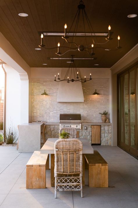 Bar stools around a counter for casual dining.
Outdoor dining table with chairs for larger gatherings.
Shade and Lighting:

Pergola or awning to provide shade and shelter.
String lights or lanterns for ambiance and visibility after dark.

#Tags:
#OutdoorKitchen
#BackyardLiving
#Grilling
#OutdoorCooking
#AlFrescoDining
#HomeImprovement
#KitchenDesign
#OutdoorEntertaining
#DIYProjects Pool House Grill Area, Back Porch And Patio Ideas, California Outdoor Kitchen, Outdoor Dining And Kitchen, Outdoor Kitchen Off House, Outdoor Patio Ideas Kitchen, Outdoor Kitchen On Patio, Arizona Outdoor Kitchen, Back Porch Grilling Area