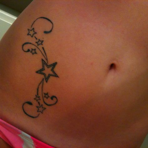 Stars tattoo 2yk Tattoo Ideas, T2k Tattoo, Pretty Simple Tattoos For Women, Rockstar Gf Tattoo Ideas, Star Y2k Tattoo, Simple Y2k Tattoo, Star Tattoo On Stomach, Simple Stomach Tattoos, Star Waist Tattoo