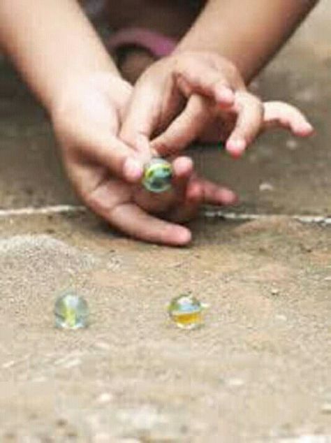 Childhood Memories Photography, How To Play Marbles, Childhood Memories Quotes, Childhood Photography, Memories Photography, Childhood Games, Childrens Games, Traditional Games, Social Life