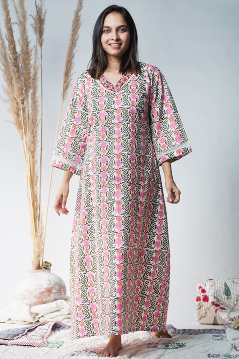 Give a luxurious touch to your loungewear with the unparalleled softness & breathable comfort of this 100% premium cotton nightie. The nightie features an overlay of exquisite hand block prints. The relaxed fit and feel are enhanced with billowy 3/4th sleeves and a chic V-neckline with lace details. Nighty Designs Indian Cotton, Indian Nighty, Nighty Designs Indian, Cotton Nighty For Women, Nighty Designs, Cotton Nighties, Night Gowns, Kurta Dress, A Line Kurta