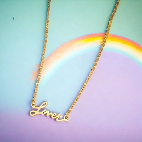 This beautiful gold tone necklace with lover spelled out is perfect for any Taylor Swift fan to their jewelry collection. The pendant features design that represents the iconic album. This would be a great accessory in honor of Taylor’s Eras tour. The lobster closure ensures that it is easy to put on and take off, making it perfect for any occasion. The necklace is 17 inches in length, making it a perfect fit for any outfit. This necklace is sure to become a favorite piece in your collection and is a must for Swifties. New in card. See pictures for details and measurements. Ships out fast! Ships daily from US. I bundle shipping with other items from my store upon request. ebay.com/str/nettsnook Lover Accessories Taylor Swift, Taylor Swift Accessories, Taylor Swift Inspired, Swift Concert, The Lobster, Taylor Swift Concert, Taylor Swift Fan, Gold Tone Necklace, Fashion Jewelry Necklaces