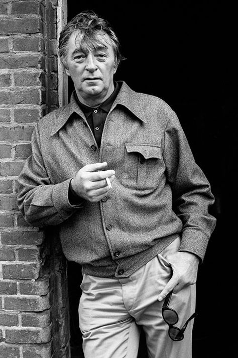 Actor Robert Mitchum (1917 – 1997) leaning at a wall of a barn in Holland, during the shooting of ‘The Amsterdam Kill’, 1977. Robert Mitchum, Terry O Neill, Tiger Beat, Hollywood Men, Private Eye, Hollywood Actors, Film Stars, Actors Images, Film History