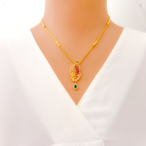 Elegant and enduring, this 22k gold CZ necklace set embodies sophistication with its exquisite craftsmanship and radiant appeal. Weighing 15.3 grams, the lustrous yellow gold finish enhances the brilliance of dazzling cubic zirconia stones. The 17-inch necklace, featuring a refined 1.6-inch drop, drapes gracefully along the neckline, while 0.6-inch adjustable links ensure a perfect fit. Secured with a reliable lobster lock, it offers both style and convenience. The matching 1-inch earrings, designed with secure screw-back posts, complete this iconic set. A timeless choice for those who appreciate classic beauty with a touch of modern luxury. PRODUCT DETAILS Gold Purity(karat): 22k Item Weight(grams): 15.3 Item Finish: Yellow Gold Stone: Cubic Zirconia Necklace Length: 17" Drop Length: 1.6" Zirconia Necklace, Cubic Zirconia Necklace, Lock It, Cz Necklace, Gold Stone, Classic Beauty, 22k Gold, Necklace Length, Touch Of Modern