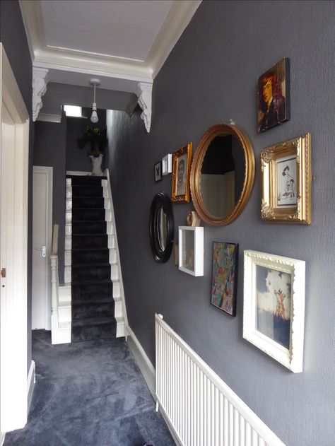 Edwardian hallway complete! Dark grey paint with dark grey carpets. #styleitdark. #picturewall Dark Gray Hallway Ideas, Carpeted Hallway Ideas, Dark Grey Woodwork Hallway, Dark Gray Hallway, Dark Grey Entrance Hall, Dark Grey Entryway, Dark Grey Hallway Ideas, Dark Painted Hallway, Dark Hallway Paint Colors