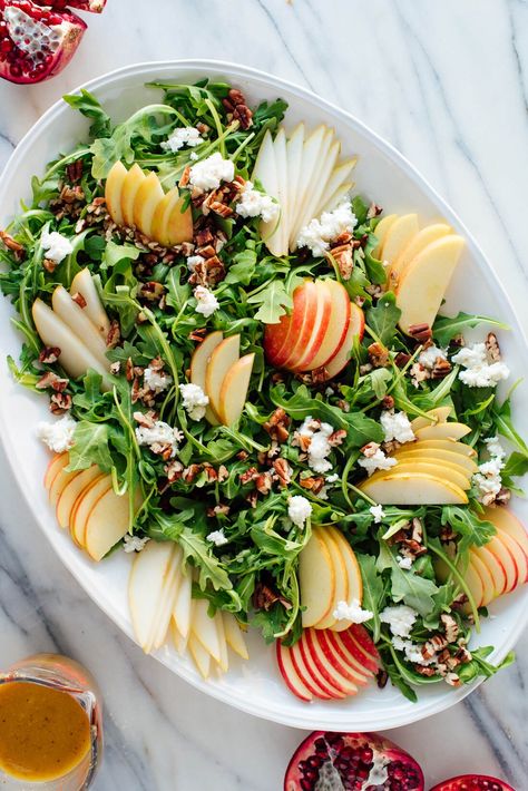 Pomegranate & Pear Green Salad with Ginger Dressing - Cookie and Kate Fig Pear Salad, Holiday Salad Pomegranate, Pear Pomegranate Salad Recipes, Pomegranate Pecan Salad, Pomegranate Walnut Salad, Pear And Apple Salad, Pear And Brie Salad, Pomegranate Pear Salad, Salad With Pears And Goat Cheese