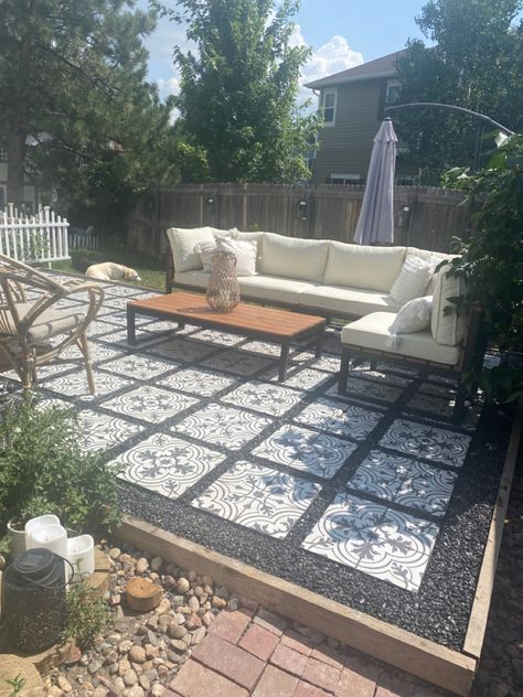 Diy Patio Ground Ideas, Pebble And Paver Patio, Rock Patio Ideas On A Budget, Diy Patio Concrete Makeover, Outside Rock Patio Ideas, Non Concrete Patio Ideas, Patio Set On Grass Yards, Backyard Rock Patio, Black And White Rock Landscaping