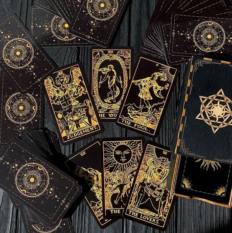 Tarot Card Deck Design, Tarot Card Collection, Golden Tarot Deck, Tarot Deck Aesthetic, Gold Tarot Cards, Tarot Cards Decks, Tarot Cards Design, Beautiful Tarot Cards, Black Tarot Cards