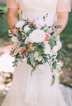 Brides.com: . A mixed bouquet with white and pink roses, succulents, and greenery, created by Art with Nature. Succulent Bouquet Wedding, White And Pink Roses, Flowers And Greenery, Green Bouquet, Succulent Bouquet, Boda Mexicana, Rose Wedding Bouquet, Cascade Bouquet, White Wedding Bouquets