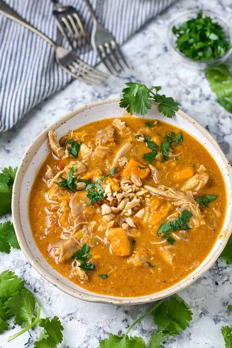 African Peanut Chicken Stew Recipe: Chicken and sweet potatoes simmered in creamy peanut butter broth with garlic, ginger and a kick of cayenne. Wow is this delicious! #GlutenFree #DairyFree #PeanutStew #ChickenStew #AfricanPeanutStew Peanut Butter Savory Recipes, Liberian Culture, West African Peanut Stew, Stew With Chicken, Chicken And Sweet Potatoes, African Peanut Soup, African Peanut Stew, Spicy Stew, Liberian Food