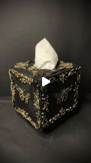 Nathalie Karasek on Instagram: "This tissue box turned out rather kitschy but I still like it somehow :-) It’s a blank wooden tissue box that I turned into a richly ornamented black gold gothic steampunk-ish piece. On Youtube you can watch the full length video of this project. 🖤 #upcyclingart #upcycling #diyhomedecor #diy #design #art #decor #ornaments #applique #gothichome #gothichomedecor #gothic #steampunk #steampunkdecor #steampunkart #maximalism #Moreismore #maximalismdecor #vintagehomedecor #shabbychic #Fantasydecor #ichmachmirdieweltwiesiemirgefällt #gold #patina #tissuebox #tissuebox #timelapse" Maximalism Decor, Steampunk Home Decor, Steampunk House, Fantasy Decor, Steampunk Decor, Art Lifestyle, Gothic Steampunk, Steampunk Art, Maximalism