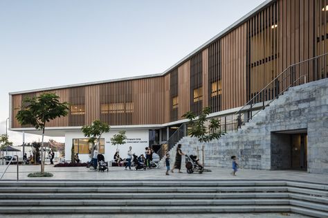 Completed in 2016 in Rehovot, Israel. Images by Amit Geron . Creating a new urban plaza, the project includes studios for dance, music, sports and a library. Completed in 2016. The community center includes a... Architecture Community, Galleries Architecture, Stone Facade, Public Architecture, Hospital Design, Cultural Architecture, Education Architecture, Community Center, Diagram Architecture