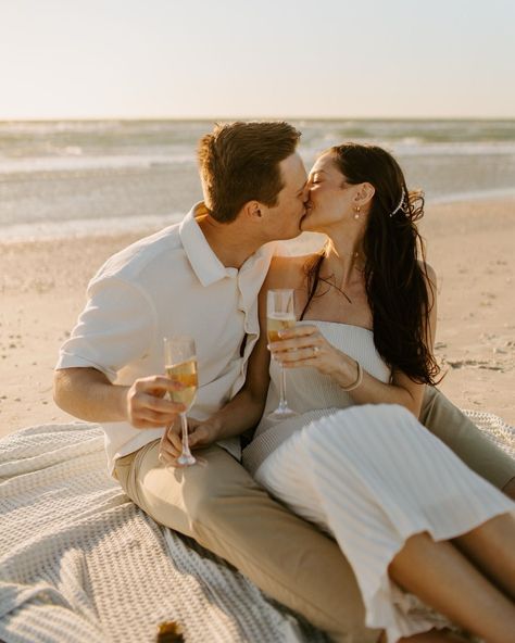 A very windy day turned into one of my fave engagement shoots 💍🌬️ Eric + Abby have the sweetest love and I am so happy I got to document this time for them!! Also isn’t her dress incredible!? There’s something about simplicity that is so elegant!! ✨ [beach engagement, engagement photos, St Pete beach photographer, st Pete photographer, Florida wedding photographer, beach engagement photos, documentary style photos, documentary photography] Engagement Photos Casual Outfits Summer, Casual Beach Proposal, Engagement Photo On Beach, Engagement Photos Florida, Beach Engagement Session, Beach Photo Ideas For Couples, Casual Beach Engagement Photos, Engagement Shoot Dress, Beach Engagement Photos Ideas