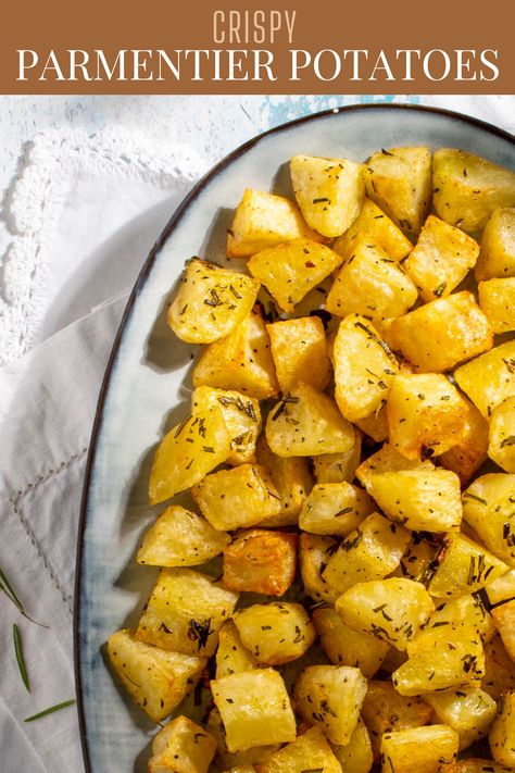 Parmentier potatoes in an oval dish on white napkins. Parmentier Potatoes, Roasted Mini Potatoes, French Potatoes, Mini Potatoes, Appetizers For A Crowd, Potato Recipes Side Dishes, Potato Sides, Potato Side Dishes, European Food