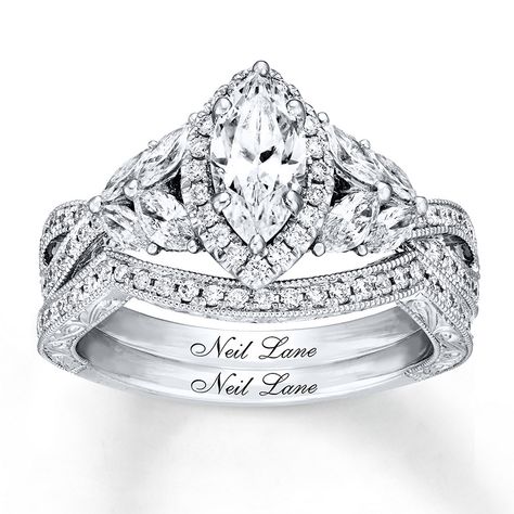 A mesmerizing marquise diamond steals the show in this spellbinding bridal set from Neil Lane Bridal®. Brilliant marquise and round diamonds grace the 14K white gold band of the engagement ring, while more diamonds sparkle on the matching contoured wedding band, bringing the total diamond weight of the bridal set to 1 1/2 carats. Neil Lane's signature appears inside each band. Diamond Total Carat Weight may range from 1.45 - 1.57 carats. Neil Lane Bridal Set, Prong Setting Engagement Ring, Contoured Wedding Band, Neil Lane Engagement Rings, Round Wedding Band, Neil Lane, Contour Wedding Band, Diamond Solitaire Earrings, Set Rings